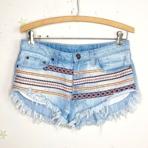 𝅺California moon rise BoHo fringe distressed denim shorts